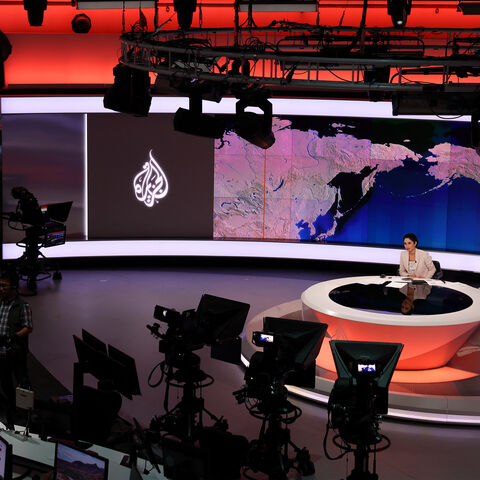 This picture shows a view of the newsroom at the main headquarters of Qatari news broadcaster Al Jazeera in the capital Doha on May 6, 2024. Al Jazeera went off-air in Israel on May 5, after Prime Minister Benjamin Netanyahu's government decided to shut it down following a long-running feud, a move the Qatar-based channel decried as "criminal". (Photo by KARIM JAAFAR / AFP) (Photo by KARIM JAAFAR/AFP via Getty Images)