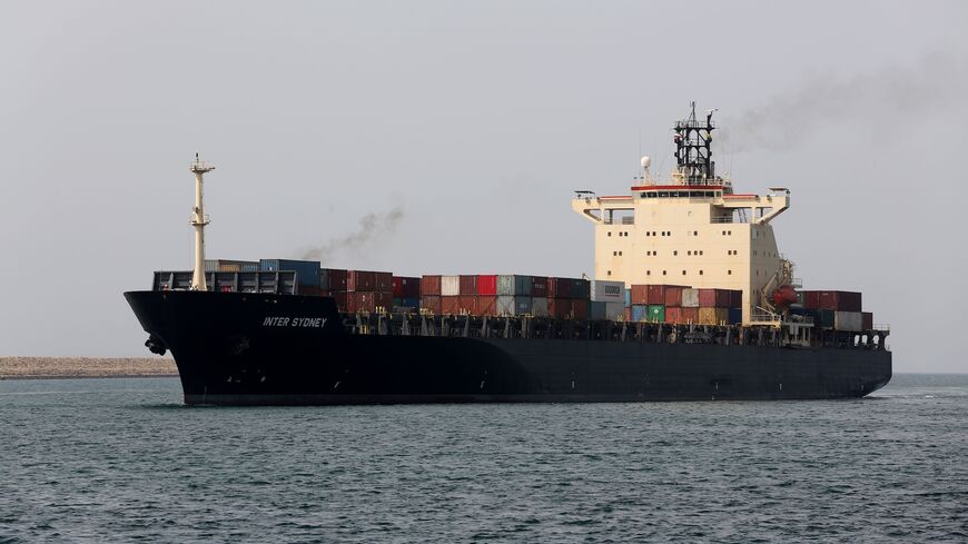 The cargo ship Inter Sydney, flying under the flag of Saint Vincent and the Grenadines, sails through the Shahid Beheshti Port in the southeastern Iranian coastal city of Chabahar, on the Gulf of Oman, during an inauguration ceremony of new equipment and infrastructure on Feb. 25, 2019. 