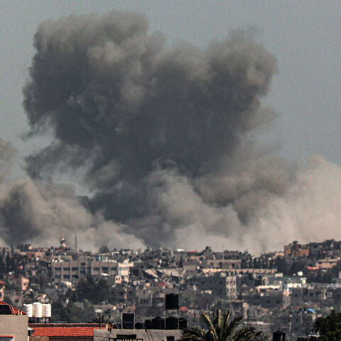 A picture taken from Rafah shows smoke billowing after Israeli bombardment on Khan Yunis in the southern Gaza Strip on March 21, 2024, amid ongoing battles between Israel and the Palestinian militant group Hamas.