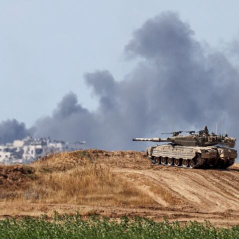 An Israeli army battle tank takes a position in southern Israel near the border with the Gaza Strip on May 13, 2024, amid the ongoing conflict in the Palestinian territory between Israel and the Hamas movement.