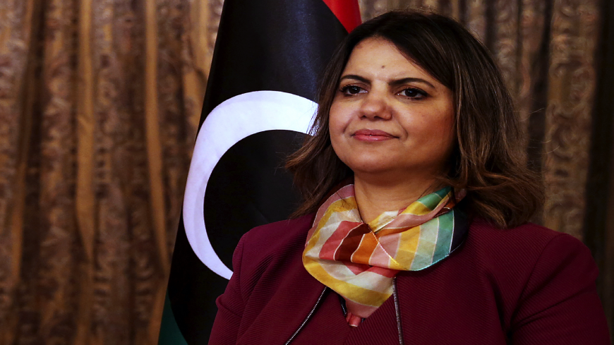 Foreign Minister in Libya's transitional Government of National Unity (GNU) Najla al-Mangoush poses for a picture in the capital Tripoli, on March 17, 2021. - The activist and lawyer from the eastern city of Benghazi is Libya's first female foreign minister, in a government which counts five women with two in key portfolios. Nevertheless this first for the country drew criticism from activists as too little and as not living up to a UN commitment. (Photo by Mahmud TURKIA / AFP) (Photo by MAHMUD TURKIA/AFP v
