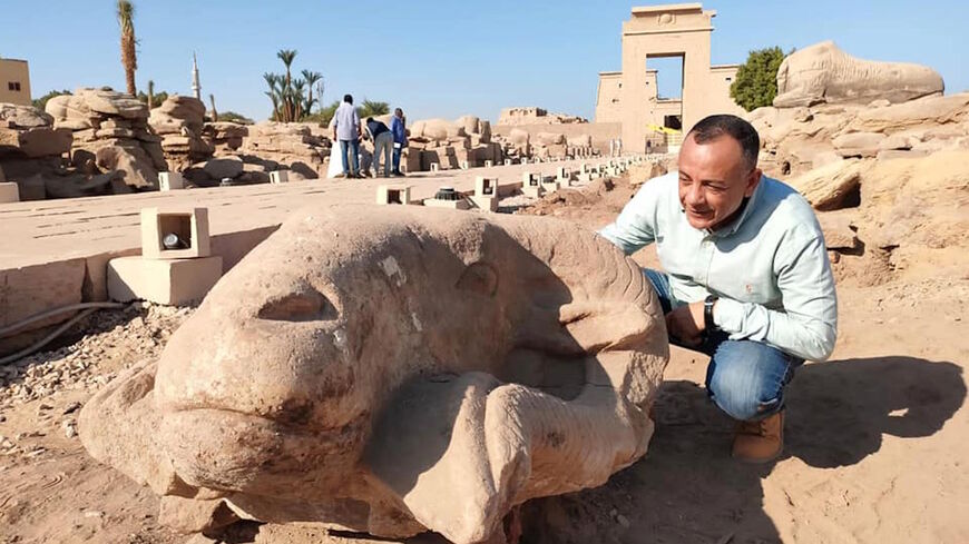 A recently discovered stone ram heads at the Avenue of Sphinxes in Luxor, Egypt.