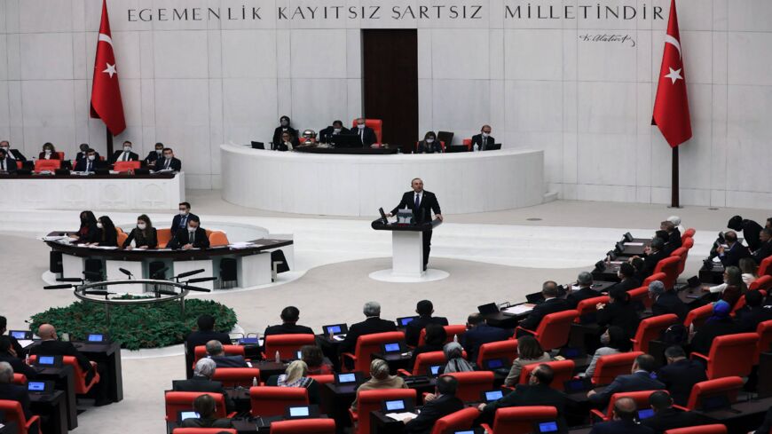 Turkish Foreign Minister Mevlut Cavusoglu speaks at the Turkish Grand National Assembly in Ankara, Dec. 13, 2021.