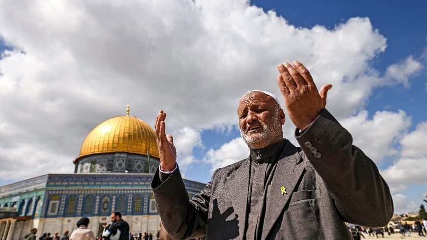 Ali al-Zayadana, brother of Youssef and uncle of Hamza who are both still kidnapped by militants in Gaza, prays for them at the Al-Aqsa mosque in east Jerusalem
