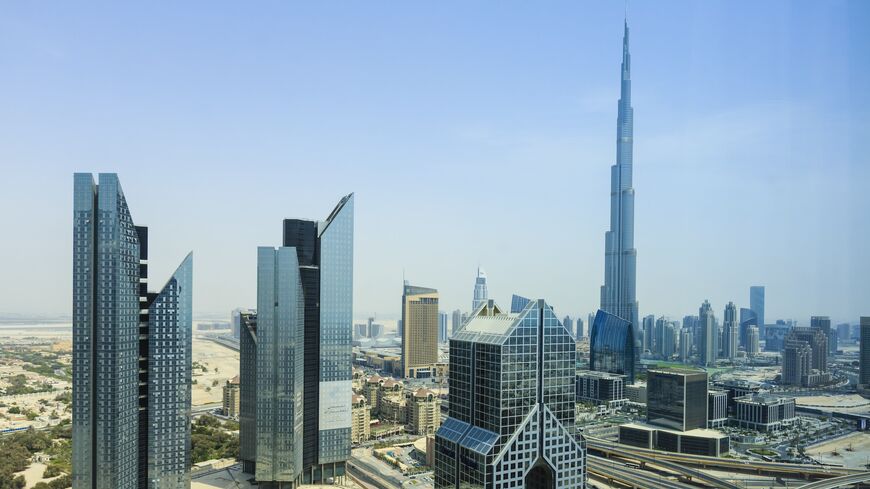 The futuristic cityscape of Dubai with the Burj Khalifa, the world's tallest building.