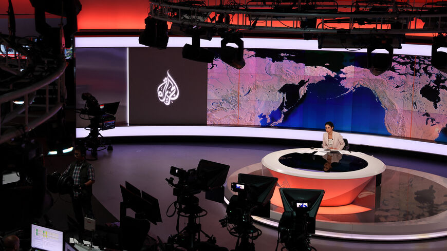 This picture shows a view of the newsroom at the main headquarters of Qatari news broadcaster Al Jazeera in the capital Doha on May 6, 2024. Al Jazeera went off-air in Israel on May 5, after Prime Minister Benjamin Netanyahu's government decided to shut it down following a long-running feud, a move the Qatar-based channel decried as "criminal". (Photo by KARIM JAAFAR / AFP) (Photo by KARIM JAAFAR/AFP via Getty Images)