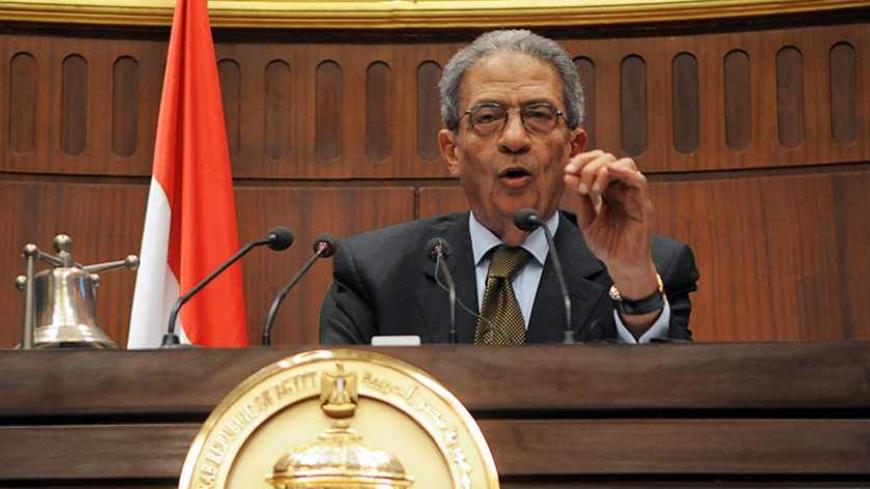 Amr Moussa, head of the assembly writing Egypt's new constitution,speaks after they finished their vote at the Shura Council in Cairo December 1, 2013. A hardline Islamist leader said the army had driven Egypt to the "edge of a precipice", as a new constitution likely to ban Islamic political parties was set to be approved on Sunday by the panel that drafted it. The 50-member constituent assembly was due to finish voting on a draft that reflects how the balance of power has shifted in Egypt since secular-mi