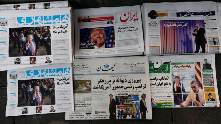 A picture taken on November 10, 2016 in the Iranian capital Tehran shows local newspapers displaying articles on US president-elect Donald Trump a day after his election.
Iran's President Hassan Rouhani said on November 9 there was "no possibility" of its nuclear deal with world powers being overturned by US president-elect Donald Trump despite his threat to rip it up.

 / AFP / ATTA KENARE        (Photo credit should read ATTA KENARE/AFP/Getty Images)