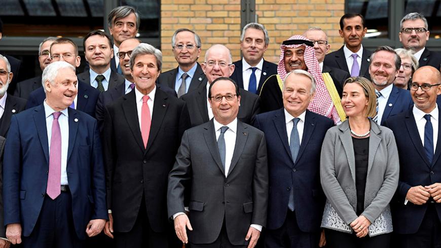 (First row From L) Russian Ambassador to France Alexander Orlov, US Secretary of State John Kerry, French President Francois Hollande, French Minister of Foreign Affairs Jean-Marc Ayrault, European Union Foreign Policy Chief Federica Mogherini, State Secretary for European Affairs Harlem Desir pose for a family picture during the Mideast peace conference in Paris, France, January 15, 2017. REUTERS/Bertrand Guay/POOL     TPX IMAGES OF THE DAY - RTSVNHB