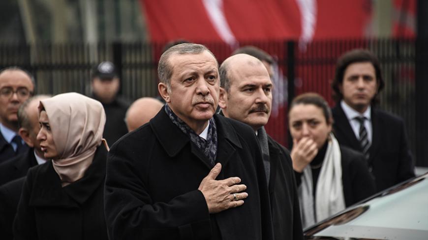 ISTANBUL, TURKEY - DECEMBER 12: Turkish President Recep Tayyip Erdogan visits the blast site outside the Besiktas FC's Vodafone Arena Stadium on December 12, 2016 in Istanbul, Turkey. At least 44 people were killed and 160 other wounded in twin explosions outside Vodafone Arena Stadium and in nearby Macka Park a few hours after the night's soccer match on 10 December. The bombs apparently targeted police officers who were securing the match. The Kurdish nationalist group Kurdistan Freedom Hawks (TAK), which