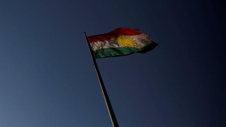 A Kurdish flag flutters atop the Citadel of Erbil, northern Iraq June 8, 2017. REUTERS/Alkis Konstantinidis - RTX39SEI