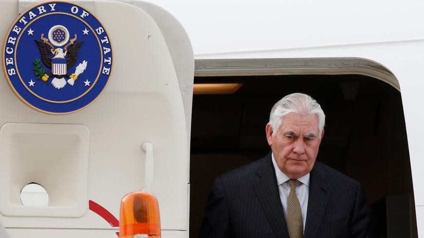 U.S. Secretary of State Rex Tillerson steps off his plane as he arrives at the presidential hangar in Mexico City, Mexico, February 1, 2018. REUTERS/Henry Romero - RC1A25512B30