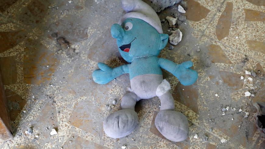A stuffed toy is found inside an abandoned house previously used by the Islamic State militants in western Mosul, Iraq June 15, 2017. REUTERS/Erik De Castro - RC1561383C60
