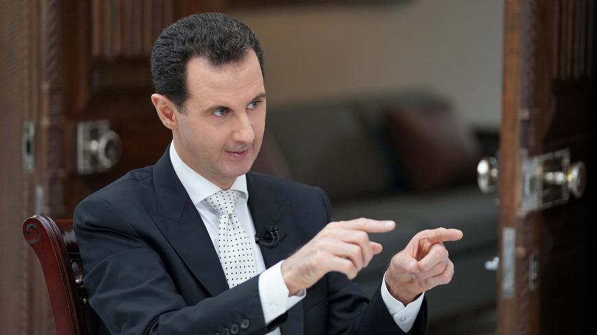 Syria's President Bashar al Assad gestures during an interview with a Greek newspaper in Damascus, Syria in this handout released May 10, 2018. SANA/Handout via Reuters   THIS IMAGE HAS BEEN SUPPLIED BY A THIRD PARTY. REUTERS IS UNABLE TO INDEPENDENTLY VERIFY THE AUTHENTICITY, CONTENT, LOCATION OR DATE OF THIS IMAGE. - RC17F6B98E00