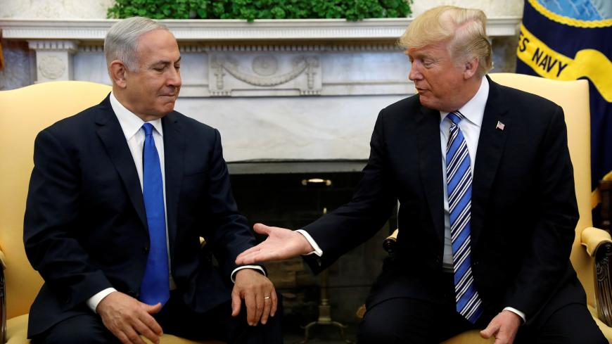 U.S. President Donald Trump meets with Israel Prime Minister Benjamin Netanyahu in the Oval Office of the White House in Washington, U.S., March 5, 2018. REUTERS/Kevin Lamarque     TPX IMAGES OF THE DAY - RC1567EA50A0