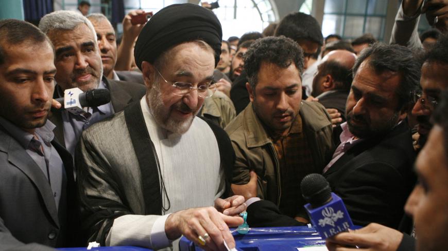 Iran's former president Mohammad Khatami casts his ballot during the presidential election, north of Tehran June 12, 2009.REUTERS/Chavosh Homavandi/jamejamonline  (IRAN POLITICS ELECTIONS) - GM1E56C1H9U01