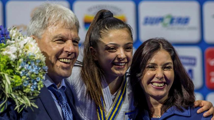 TEL AVIV, ISRAEL, APRIL 26: Under 52kg bronze medallist, Gefen Primo of Israel happily poses with Israel's Sports Minister, Mrs Miri Regev and the President of the Israel Judo Federation, Moshe Ponte during day one of the 2018 Tel Aviv European Judo Championships (26-28 April) at the Tel Aviv Convention Centre, Tel Aviv, Israel, on April 26, 2018.  (Photo by David Finch/Getty Images)