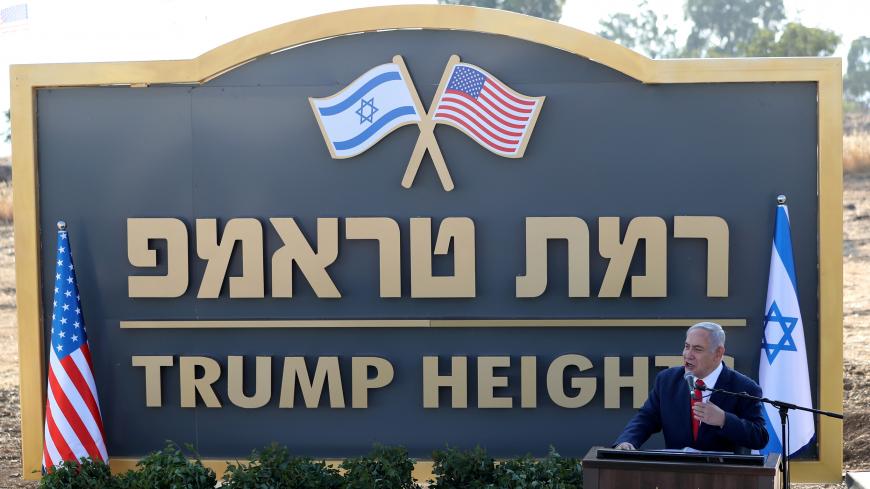 Israeli Prime Minister Benjamin Netanyahu speaks during a ceremony to unveil a sign for a new community named after U.S. President Donald Trump, in the Israeli-occupied Golan Heights June 16, 2019. REUTERS/Ammar Awad - RC1E603F4D30