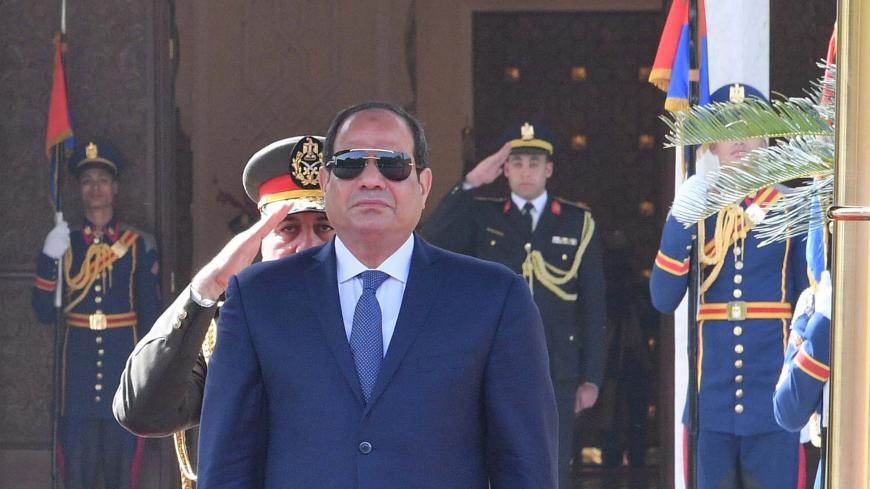 Egyptian President Abdel Fattah al-Sisi attends a welcoming ceremony with Sudan's President Omar al-Bashir (unseen) at the Ittihadiya presidential palace in Cairo, Egypt, January 27, 2019. in this handout picture courtesy of the Egyptian Presidency. The Egyptian Presidency/Handout via REUTERS ATTENTION EDITORS - THIS IMAGE WAS PROVIDED BY A THIRD PARTY - RC18C087E160