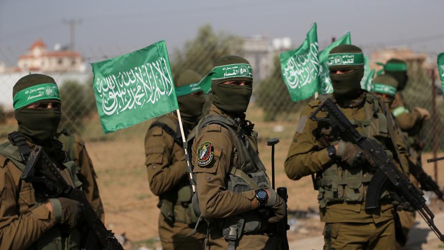 Palestinian Hamas militants take part in an anti-Israel military show in the southern Gaza Strip November 11, 2019. REUTERS/Ibraheem Abu Mustafa - RC2Z8D9ZR40Q