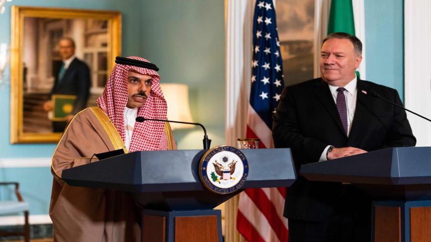 Secretary of State Mike Pompeo, right, listens to Saudi Minister of Foreign Affairs Prince Faisal bin Farhan Al Saud speaks during their meeting at the State Department, October 14, 2020, in Washington, DC. - US Secretary of State Mike Pompeo on October 14, 2020 encouraged Saudi Arabia to recognize Israel, in what would be a massive boost for the Jewish state amid normalization by two other Gulf Arab kingdoms. (Photo by Manuel Balce CENETA / POOL / AFP) (Photo by MANUEL BALCE CENETA/POOL/AFP via Getty Image