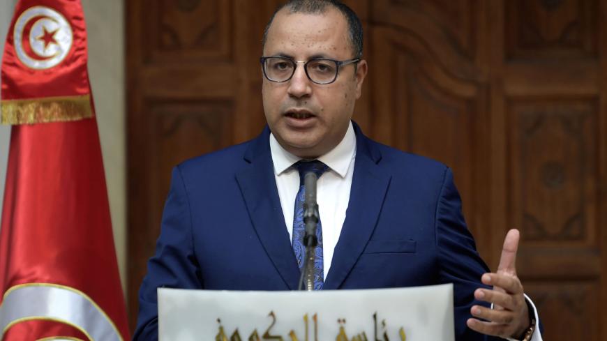 Tunisian Prime Minister Hichem Mechichi gives a press conference on November 3, 2020 in Tunis, after his meeting with several economic experts. (Photo by FETHI BELAID / AFP) (Photo by FETHI BELAID/AFP via Getty Images)