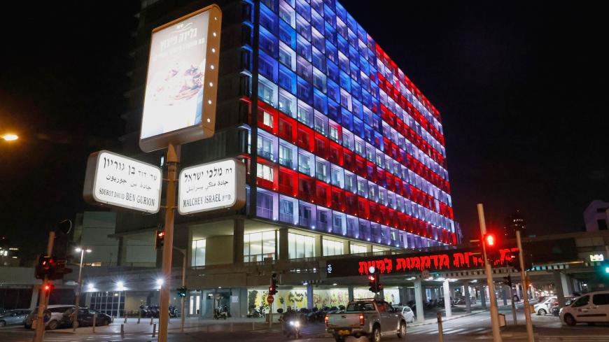 The city hall of the Israeli coastal city of Tel Aviv is lit up in the colours of the US flag as a sign of solidarity and support for democratic governance, on January 7, 2021. - The storming of the US Congress left America's image as a beacon of democracy severely tarnished, with allies unable to hide their shock and authoritarian regimes gleefully exploiting the unrest. (Photo by JACK GUEZ / AFP) (Photo by JACK GUEZ/AFP via Getty Images)