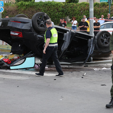 Israeli police cordon off the site of a car accident, where Israeli minister Itamar Ben-Gvir was lightly hurt after his car was involved in an accident, in Ramla south of Tel Aviv, on April 26, 2024. 