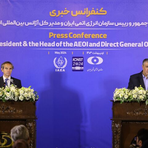 Mohammad Eslami, the head of Iran's atomic energy department, and Director General of the International Atomic Energy Agency (IAEA) Rafael Grossi take part in a press conference in Isfahan on May 7, 2024.