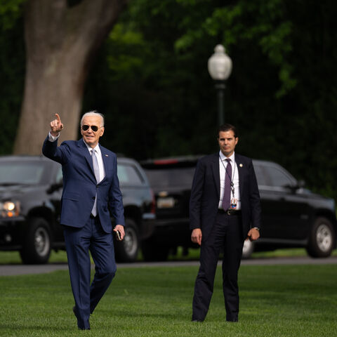 WASHINGTON, DC - MAY 9: U.S. President Joe Biden points to WNBA Champion Las Vegas Aces players and other invited guests as he walks towards Marine One on the South Lawn of the White House on May 9, 2024 in Washington, DC, for a short trip to Andrews Air Force Base, Md. Biden is traveling to San Francisco, California for campaign fundraisers. (Photo by Andrew Harnik/Getty Images)