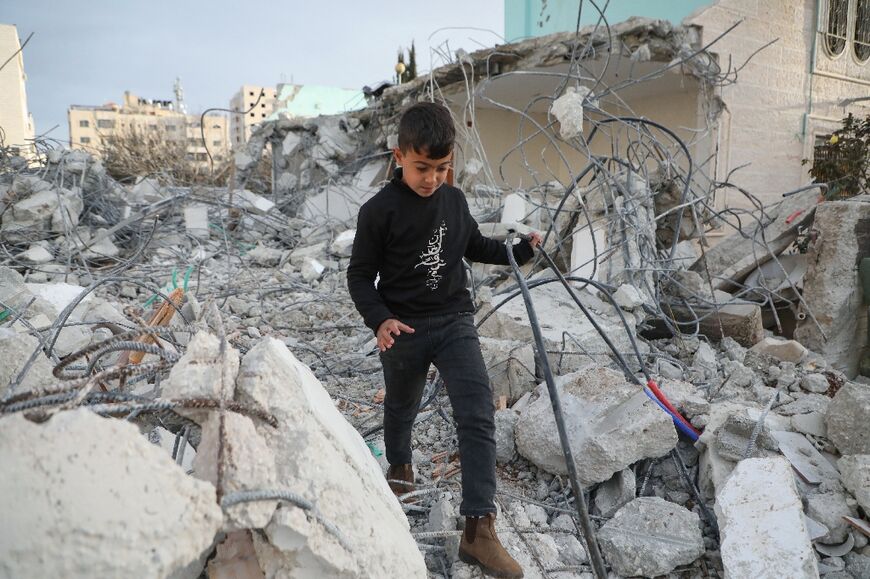 The Israeli military said it demolished two houses in Hebron belonging to two Palestinian gunmen who carried out an attack