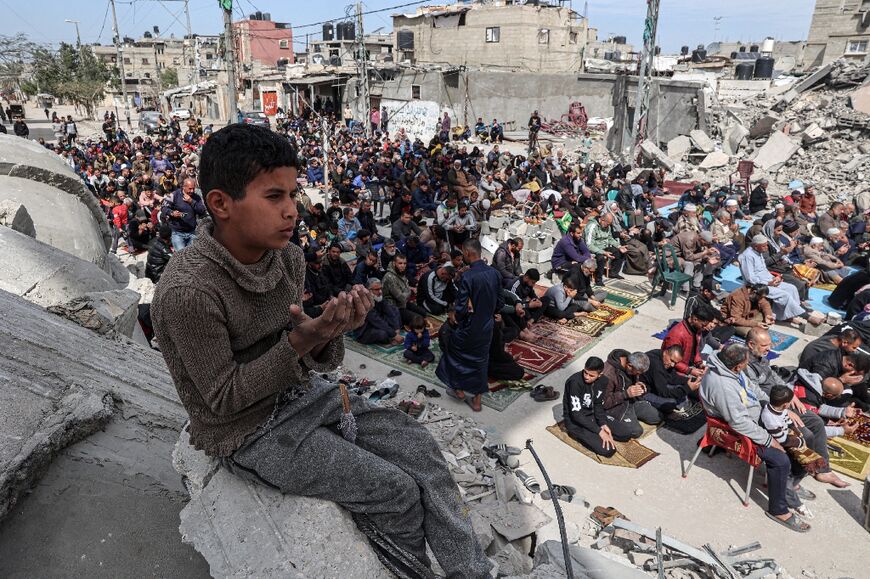 Dozens of mosques in Gaza have been destroyed, forcing worshippers to pray amid the ruins