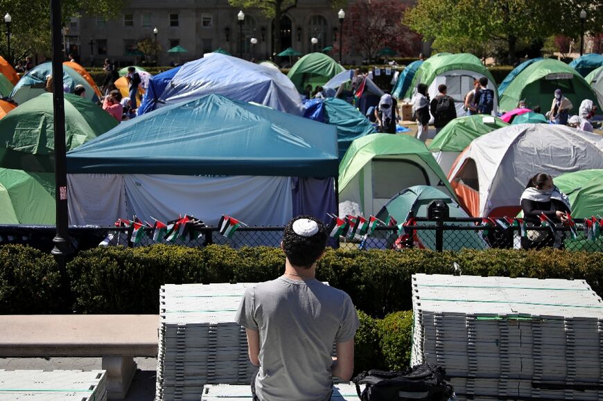 A Jewish man looks on as pro-Palestinian students and activsts gather at a protest encampment on the campus of Columbia University in New York City on April 25, 2024