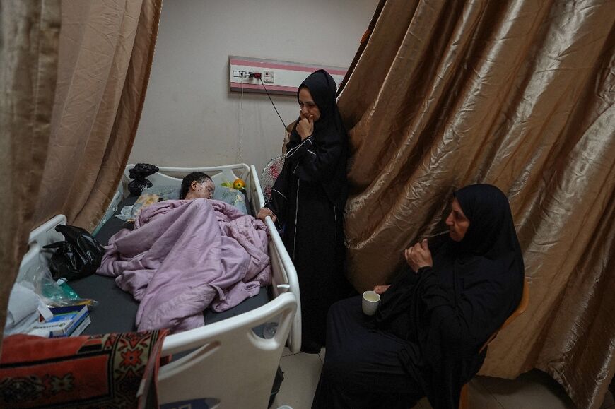 Palestinian girl Hanan Akl, 9, who was injured in Israeli bombardment, is treated at the Al-Aqsa Martyrs hospital in Deir el-Balah in the central Gaza Strip on June 22, 2024