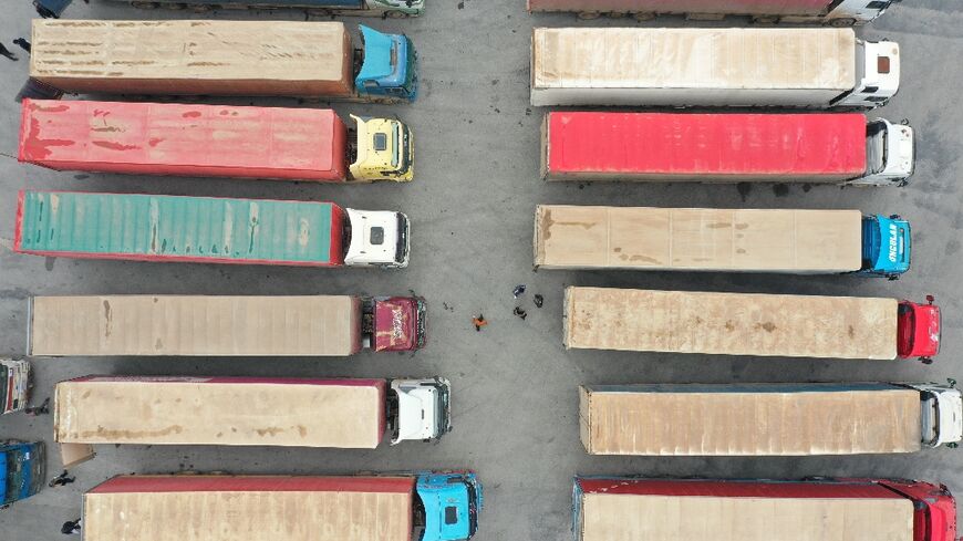 A convoy carrying desperately needed humanitarian aid for Syria pauses at the Bab al-Hawa crossing on the border with Turkey