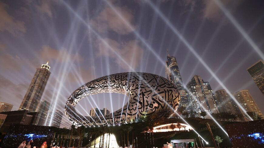 People attend the opening ceremony for the Museum of the Future in the Gulf emirate of Dubai