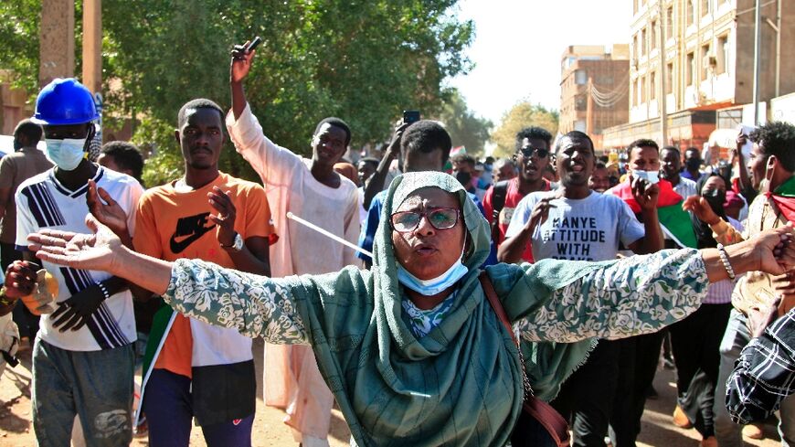 Sudanese protesters call  for civilian rule and denounce the military in the capital Khartoum's twin city of Omdurman on Monday