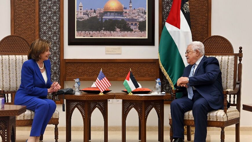 Palestinian president Mahmud Abbas (R) meets with the Speaker of the United States House of Representatives Nancy Pelosi on Thursday, in a picture provided by A handout picture provided by the Palestinian Authority's press office