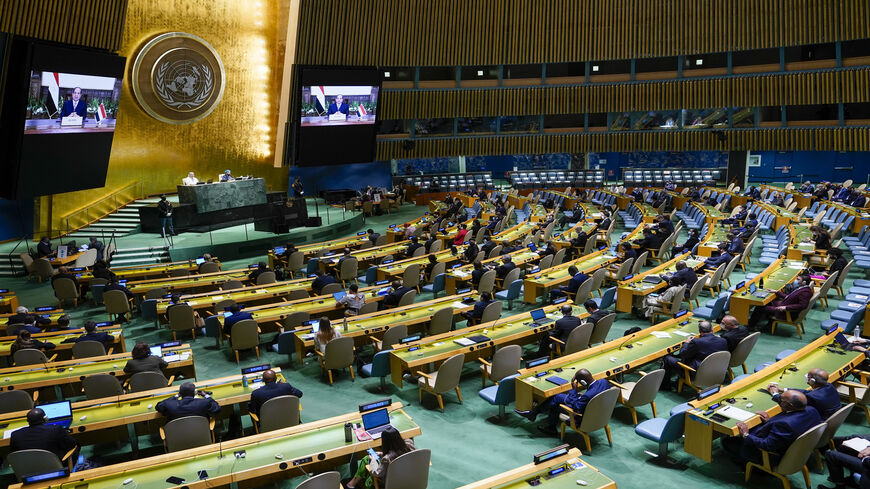 Egyptian President Abdel Fattah al-Sisi is seen on video screens as he addresses the annual gathering for the 76th session of the United Nations General Assembly, New York, Sept. 21, 2021.
