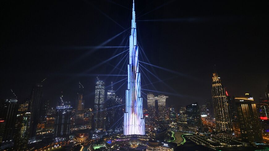 The launch of a rocket into space is projected on Dubai's Burj Khalifa on February 9, 2021 during the UAE's Al-Amal probe to Mars