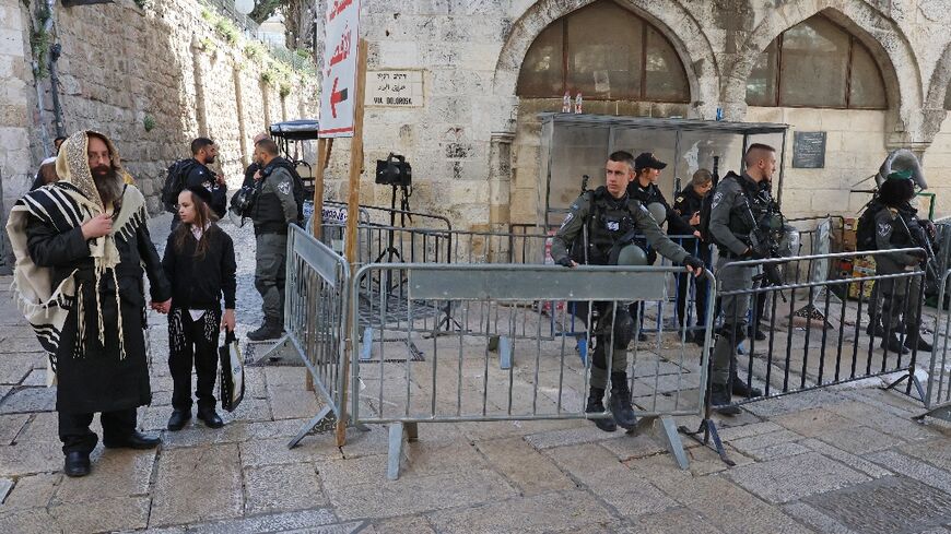 Members of Israeli security man a checkpoint in Jerusalem's Old City