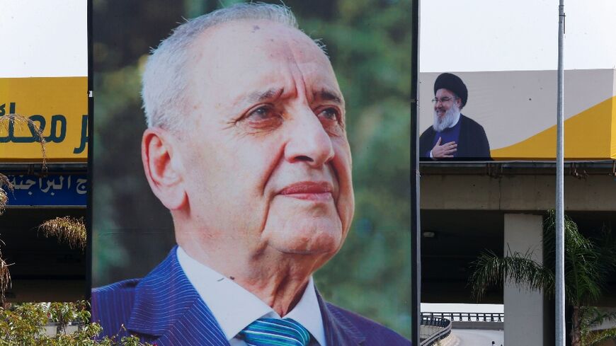 Lebanon's Parliament Speaker Nabih Berri is seen on a large billboard in Beirut, while another in the background shows Hassan Nasrallah, leader of Hezbollah