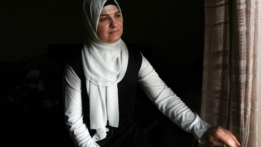 Ramya al-Sous, a refugee living in Lebanon, says she was locked out of her late husband's estate and forced to flee Syria after he died in a regime jail