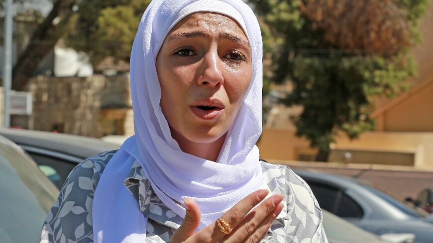 Israa Raed, whose four-month-old baby girl Malak was pulled alive from the rubble of a building more than 24 hours after it collapsed, told AFP "words cannot describe how happy I am"