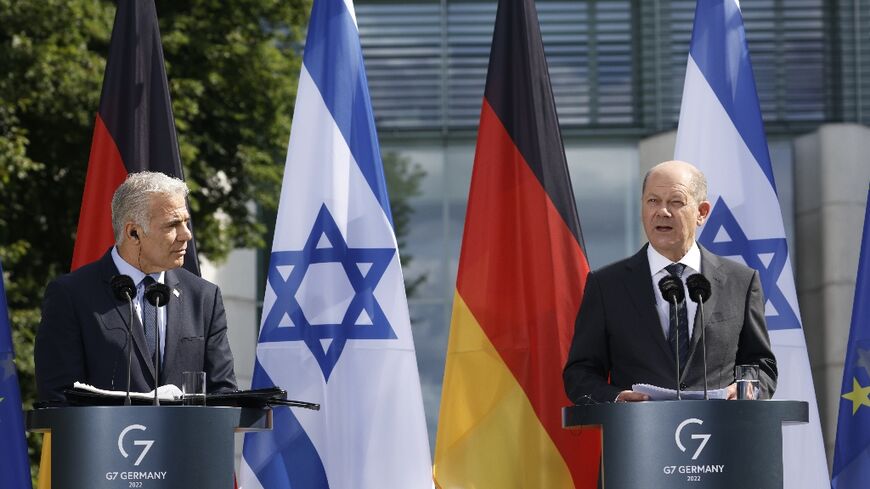 German Chancellor Olaf Scholz and Israeli Prime Minister Yair Lapid (L) hold a joint press conference after talks in Berlin, Germany, on September 12, 2022
