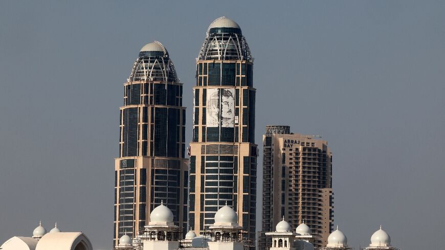 A portrait of the Emir of Qatar, Sheikh Tamim bin Hamad al-Thani, on a high-rise in the capital Doha