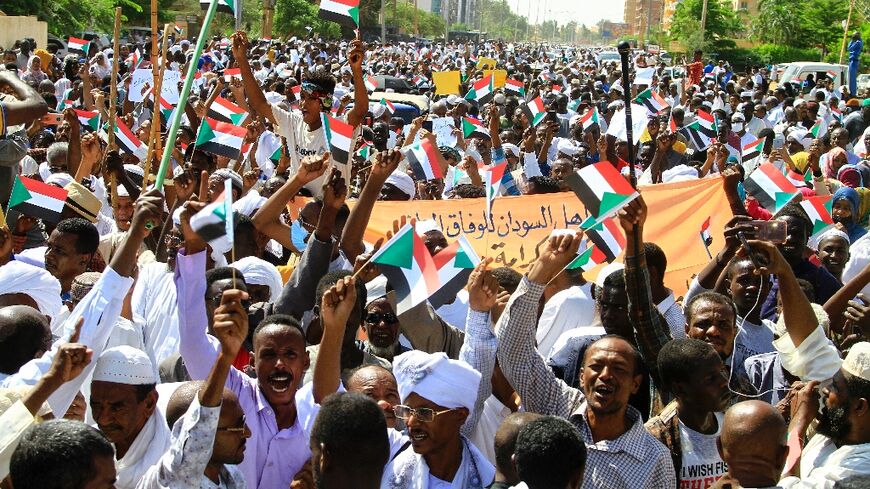 The crowd that gathered Saturday in front of the headquarters of the UN mission in Sudan chanted pro-Bashir slogans and burned photos of UN envoy Volker Perthes