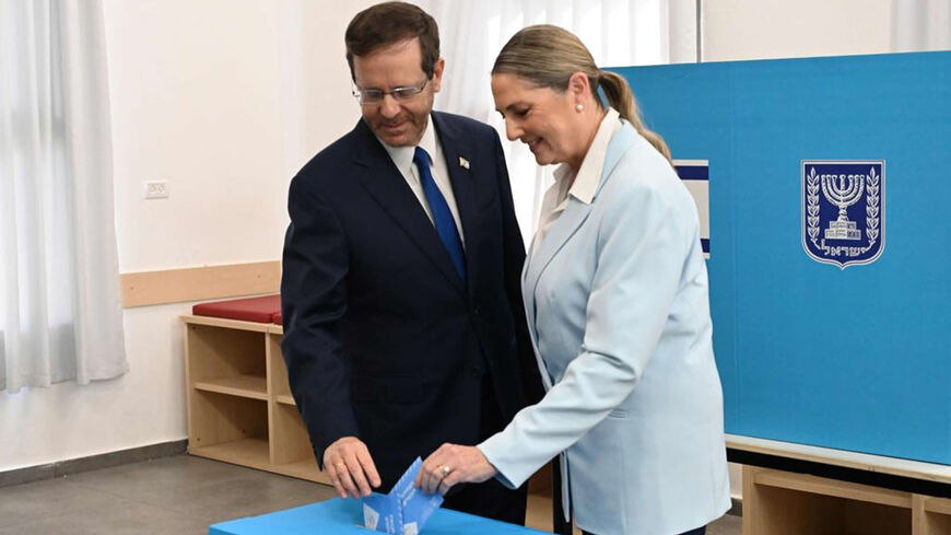 Israeli President Isaac Herzog and his wife Michal are seen voting in the general elections, Jerusalem, Nov. 1 2022.