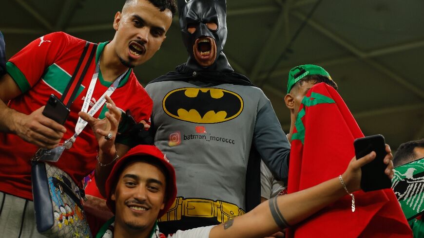 Morocco supporters celebrate their team's World Cup quarter-final victory over Portugal