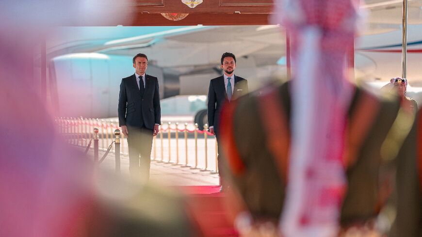 French President Emmanuel Macron is received by Jordan's Crown Prince Hussein